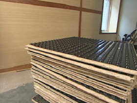 Subfloor panel packing and wrapping machine